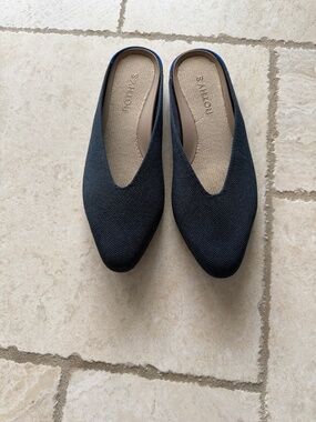 Rothy’s navy blue slides